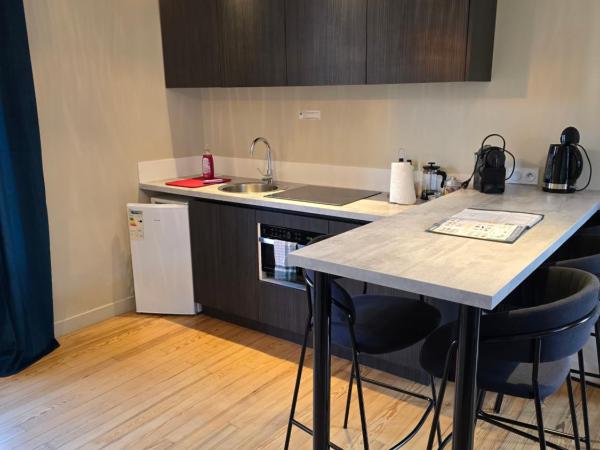 Au Loup Historic Apartments : photo 5 de la chambre appartement 5