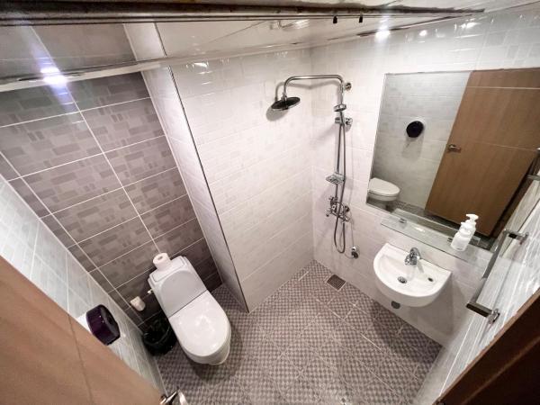 Ho Home Tel : photo 5 de la chambre chambre lits jumeaux avec salle de bains privative