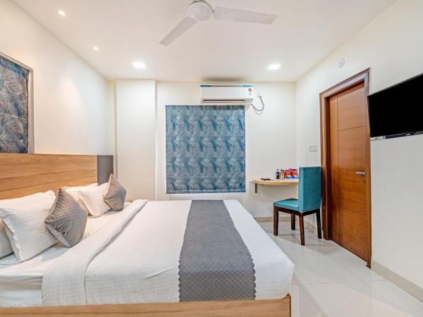 Eminent Suites and Apartments : photo 1 de la chambre chambre simple deluxe