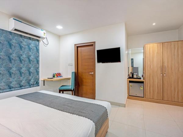 Eminent Suites and Apartments : photo 2 de la chambre chambre simple deluxe