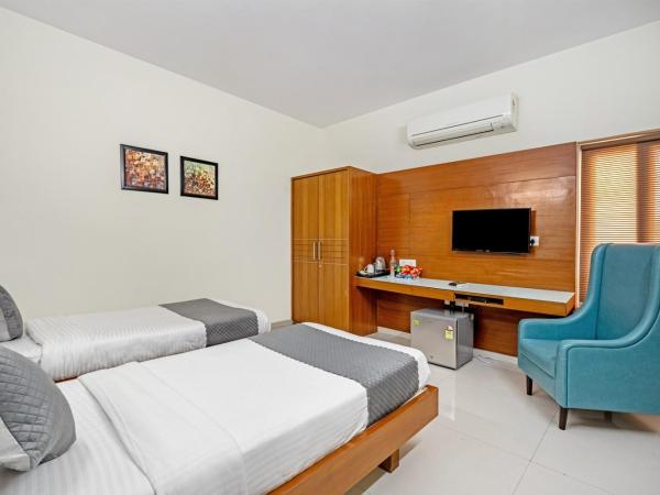 Westside Hotel Gachibowli : photo 1 de la chambre chambre deluxe double ou lits jumeaux