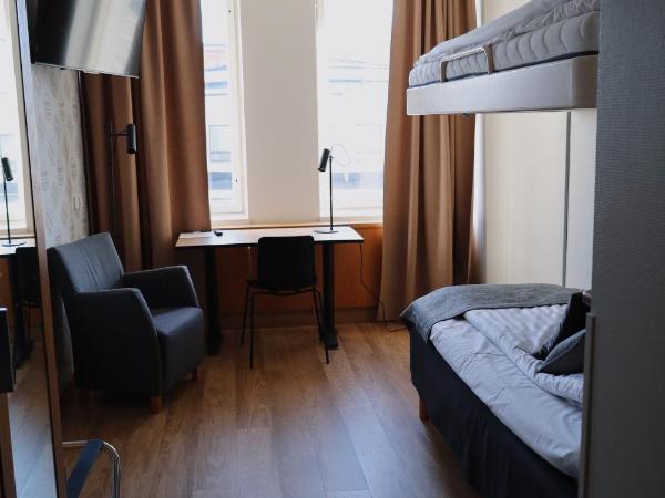 Hesehotelli Turku Linja-autoasema : photo 3 de la chambre chambre lits jumeaux