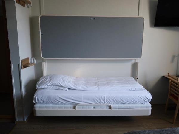 Hesehotelli Turku Linja-autoasema : photo 3 de la chambre chambre quadruple