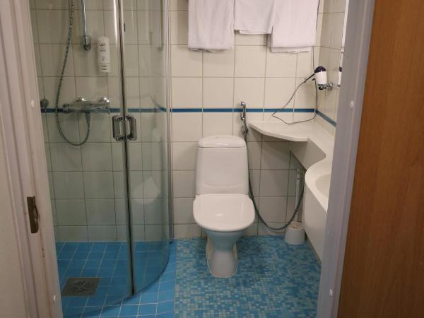 Hesehotelli Turku Linja-autoasema : photo 1 de la chambre chambre quadruple