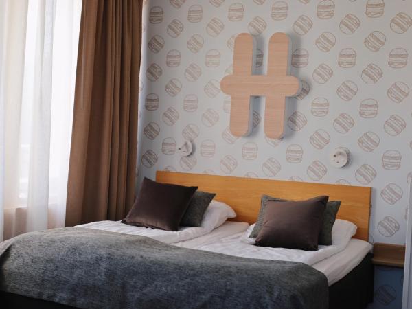 Hesehotelli Turku Linja-autoasema : photo 7 de la chambre grande chambre quadruple