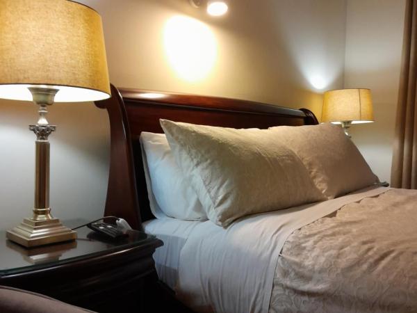 Woodhaven Manor h91rc9d : photo 5 de la chambre chambre lit king-size supérieure