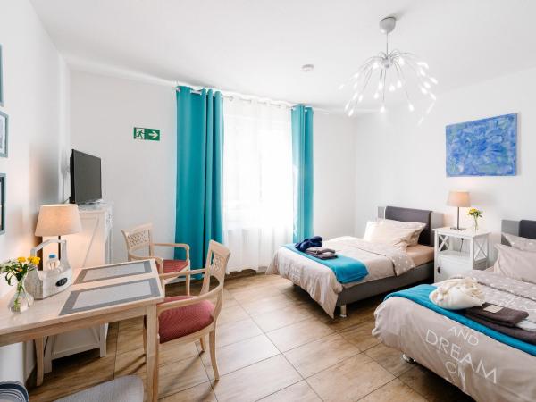 GästeHaus am Flughafen Düsseldorf : photo 9 de la chambre chambre double