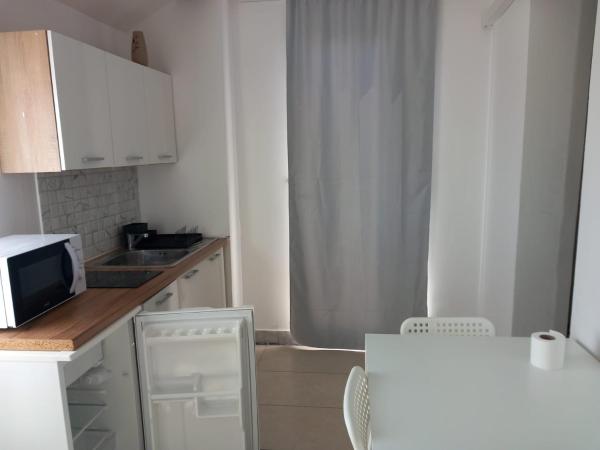 Villa Lara : photo 3 de la chambre chambre quadruple avec salle de bains privative