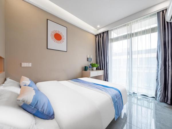 Yozo Serviced Apartment : photo 1 de la chambre studio avec balcon 