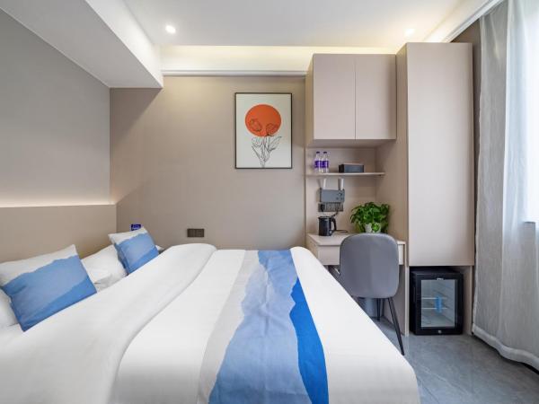 Yozo Serviced Apartment : photo 5 de la chambre studio lit queen-size 
