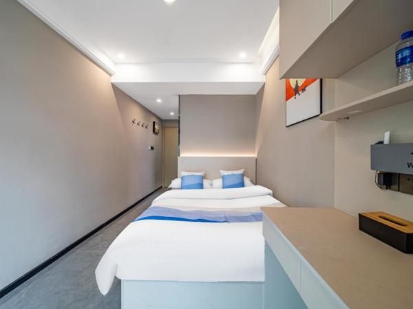 Yozo Serviced Apartment : photo 3 de la chambre studio lit queen-size 
