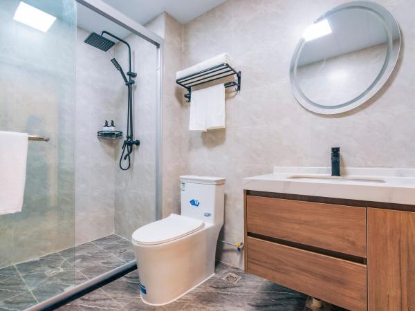 Yozo Serviced Apartment : photo 5 de la chambre chambre lits jumeaux avec salle de bains privative