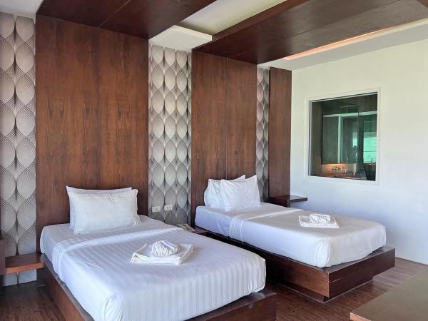 Phi Phi Cliff Beach Resort : photo 1 de la chambre chambre lits jumeaux deluxe
