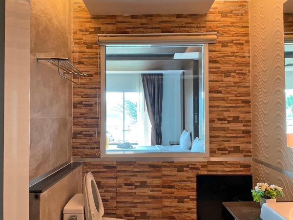 Phi Phi Cliff Beach Resort : photo 6 de la chambre chambre lits jumeaux de luxe avec vue sur mer