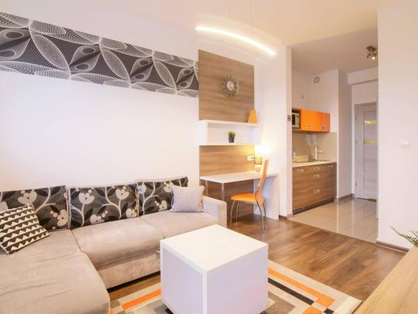 High Tower Szczecin : photo 6 de la chambre studio lit king-size avec canapé-lit