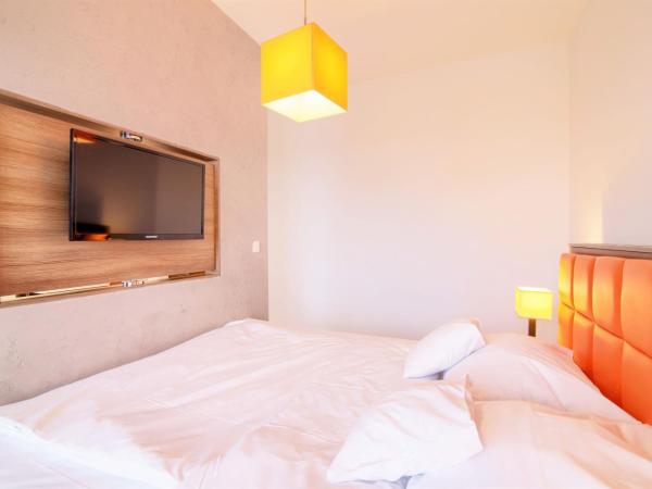 High Tower Szczecin : photo 7 de la chambre studio lit king-size avec canapé-lit