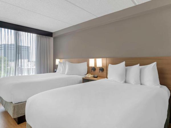 Hyatt Place Houston-North : photo 5 de la chambre chambre avec 2 lits doubles et canapé-lit