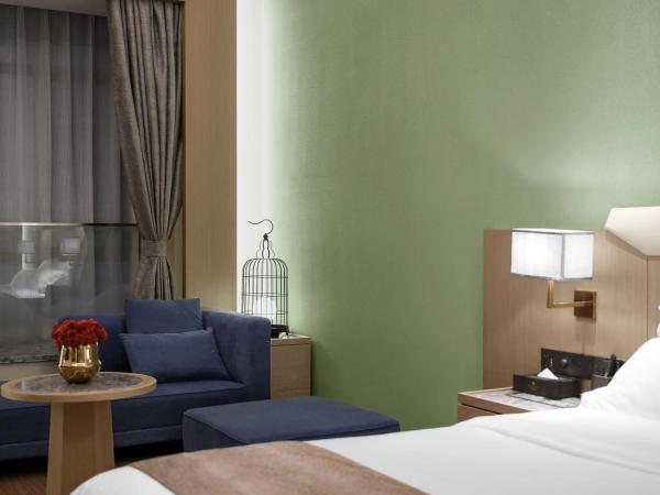 Metropolo Jingjiang Hotels- JiangNan market ShuangLong : photo 3 de la chambre deluxe business king room 