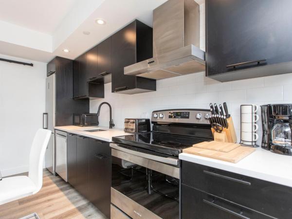 Westview Luxury Suites : photo 6 de la chambre suite lit queen-size deluxe