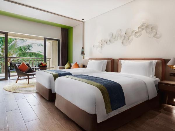 Holiday Inn Resort Sanya Bay, an IHG Hotel : photo 1 de la chambre chambre double premium avec 2 lits doubles – vue sur piscine