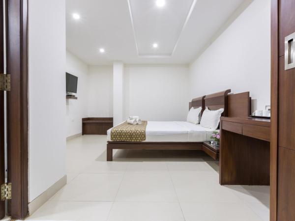 Sanctum Suites BEL Road Bangalore : photo 4 de la chambre chambre lit king-size standard