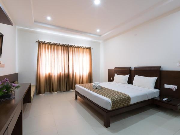 Sanctum Suites BEL Road Bangalore : photo 3 de la chambre chambre lit king-size premium