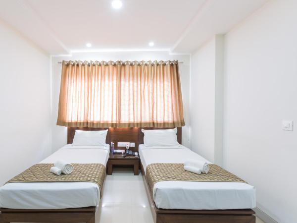 Sanctum Suites BEL Road Bangalore : photo 6 de la chambre chambre lits jumeaux standard