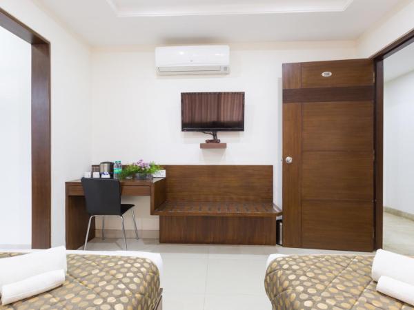 Sanctum Suites BEL Road Bangalore : photo 2 de la chambre chambre lits jumeaux standard