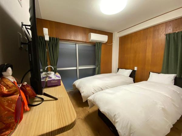 浅草・花豆HOTEL : photo 3 de la chambre chambre lits jumeaux