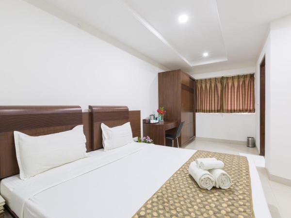 Sanctum Suites BEL Road Bangalore : photo 2 de la chambre chambre lit king-size standard