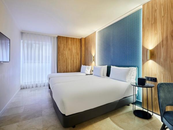 Exe Mitre : photo 1 de la chambre chambre triple