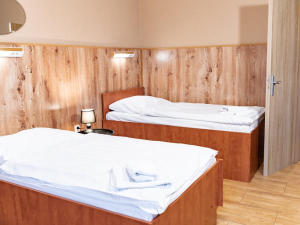 Hotel Taurus : photo 7 de la chambre chambre quadruple