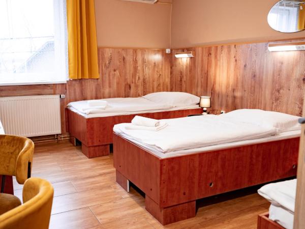 Hotel Taurus : photo 8 de la chambre chambre quadruple