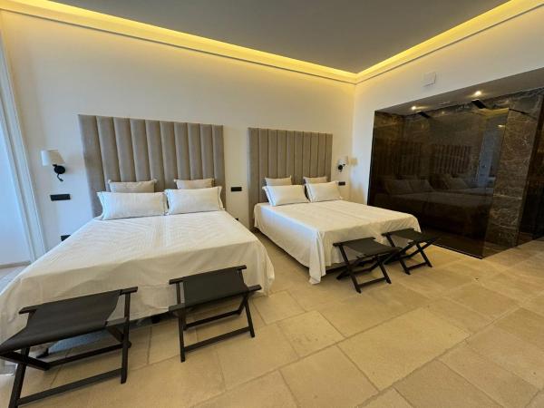 Al Capri Suite Isola di Capri : photo 1 de la chambre chambre double deluxe avec balcon - vue sur mer