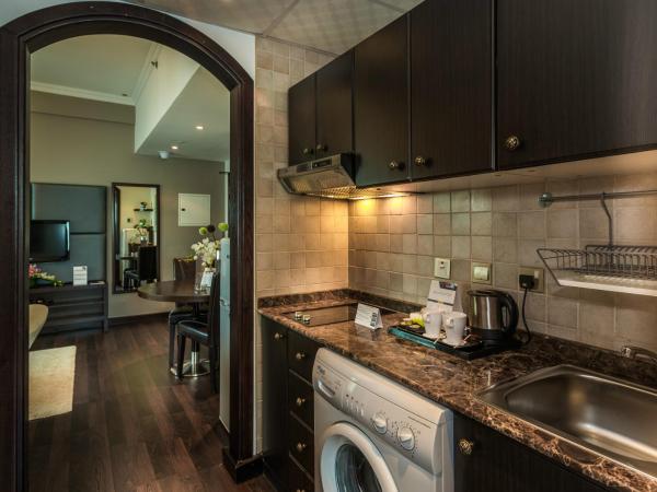 First Central Hotel Suites : photo 8 de la chambre suite exécutive 1 chambre lits jumeaux