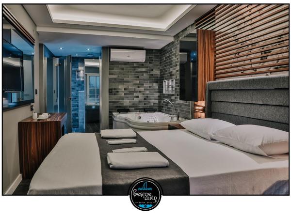 çesme marin butik otel : photo 4 de la chambre suite - vue sur jardin