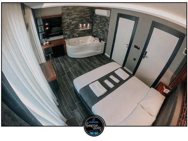 çesme marin butik otel : photo 2 de la chambre chambre triple de luxe