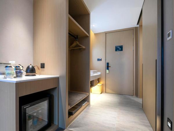 Atour Hotel Ningbo Zhenhai New City : photo 1 de la chambre jimu twin room with lake view