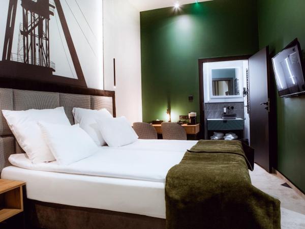 Hotel M23 Mariacka Katowice Centrum : photo 9 de la chambre chambre double deluxe