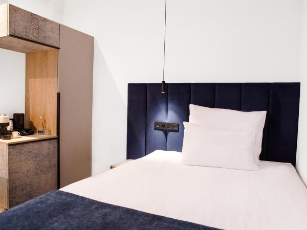 Hotel M23 Mariacka Katowice Centrum : photo 2 de la chambre chambre simple supérieure