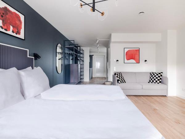 numa I Leo Apartments : photo 8 de la chambre studio familial