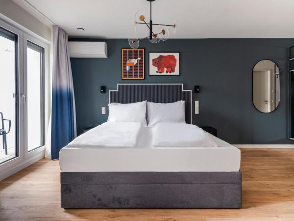 numa I Leo Apartments : photo 2 de la chambre studio familial