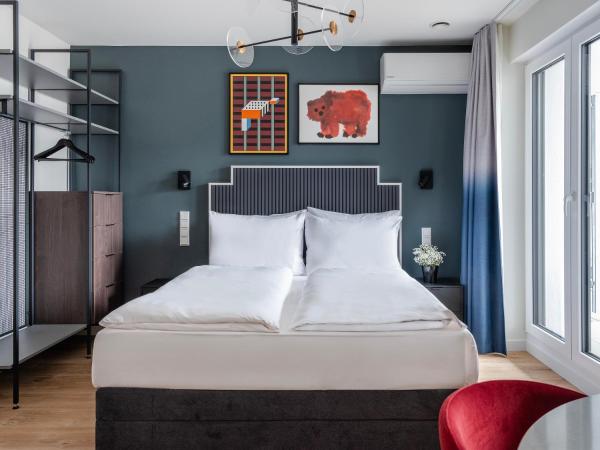 numa I Leo Apartments : photo 1 de la chambre studio