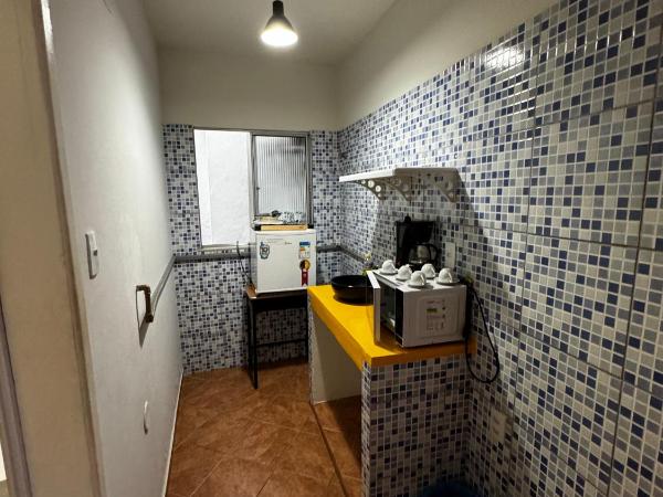 Tamboleiros Hotel & Hostel : photo 6 de la chambre chambre triple Économique avec salle de bains commune