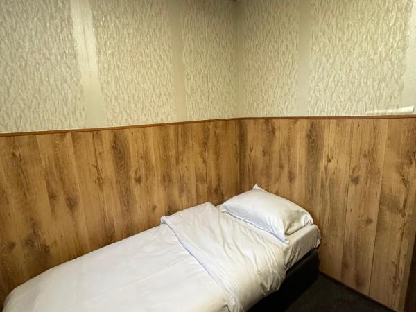 Flex-Inn : photo 2 de la chambre chambre simple avec salle de bains commune