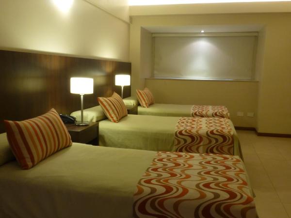 Hotel Intersur San Telmo : photo 3 de la chambre chambre triple basique