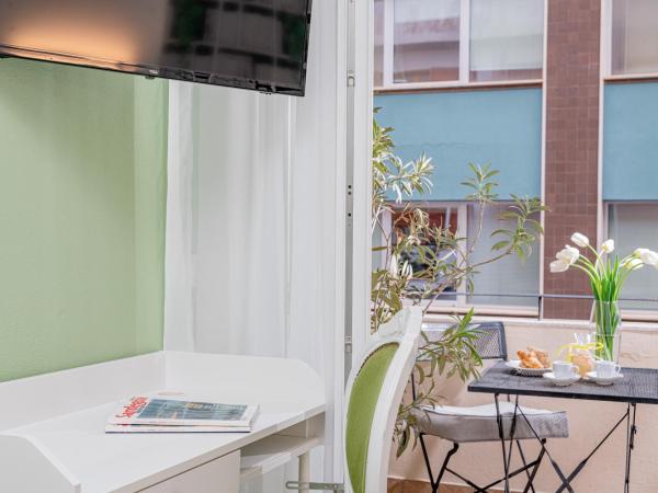 Residenze Asproni Serviced Apartments : photo 1 de la chambre chambre double