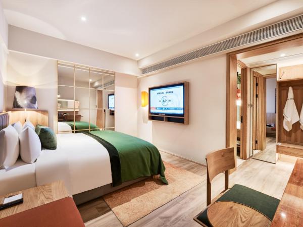 Panda Hotel : photo 1 de la chambre chambre supérieure lit queen-size