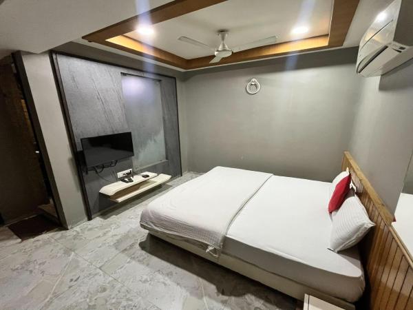 Hotel Om Balaji : photo 3 de la chambre chambre deluxe