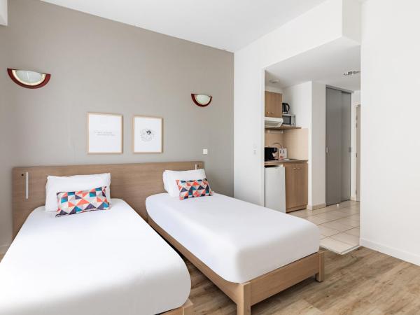 Appart'City Confort Le Mans Centre Gare : photo 1 de la chambre studio lits jumeaux